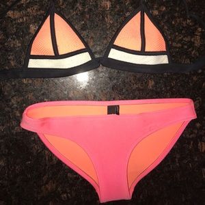 authentic triangl swimsuit size XS